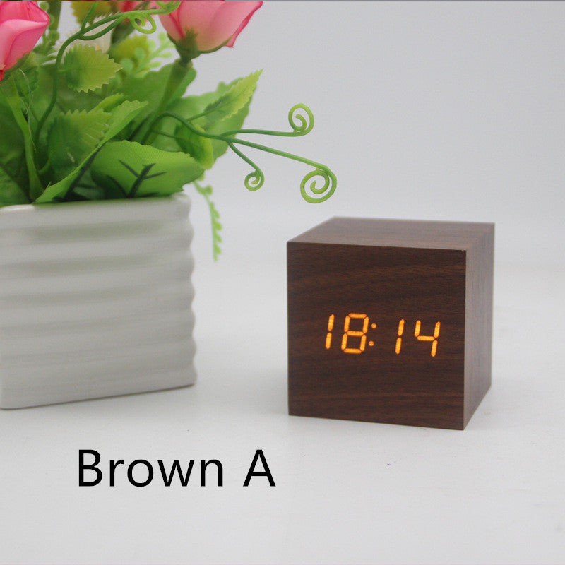 Minimalist Cube shaped sound-sensitive wooden digital clock with temperature display