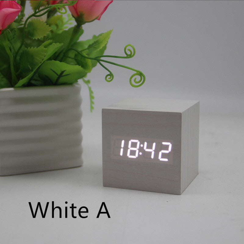 Minimalist Cube shaped sound-sensitive wooden digital clock with temperature display