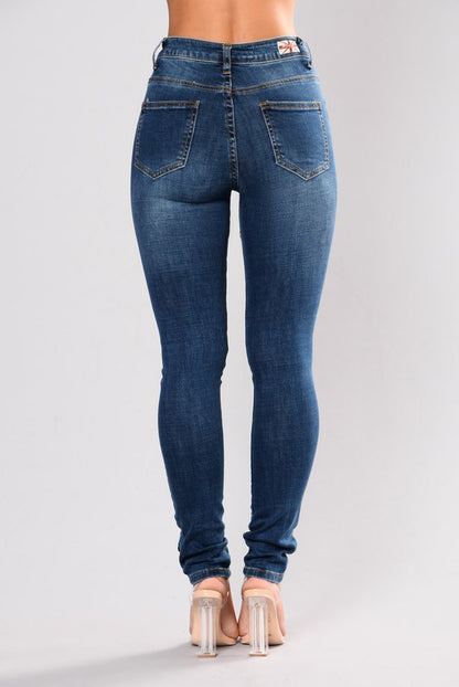 Perforated embroidered high elastic jeans