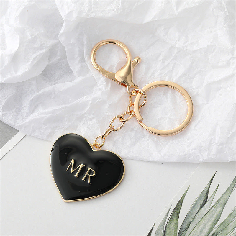 South Korea Simple Personality Alloy Black And White Peach Heart Keychain