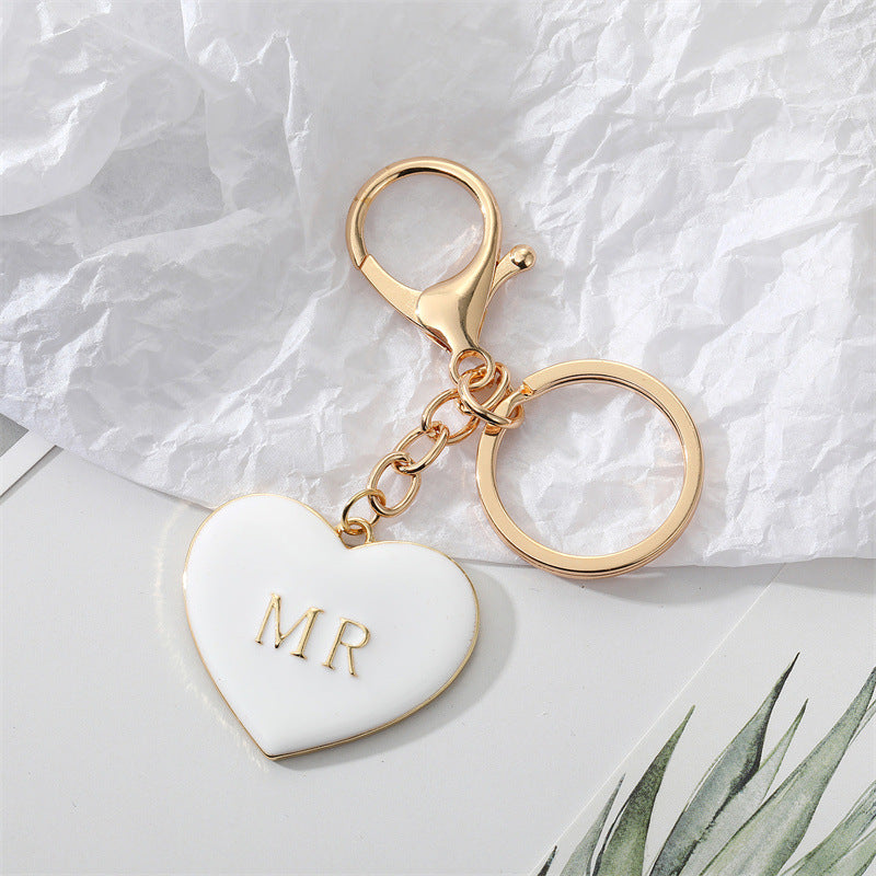 South Korea Simple Personality Alloy Black And White Peach Heart Keychain
