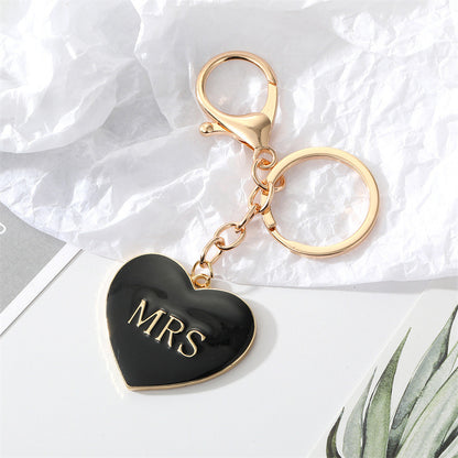 South Korea Simple Personality Alloy Black And White Peach Heart Keychain