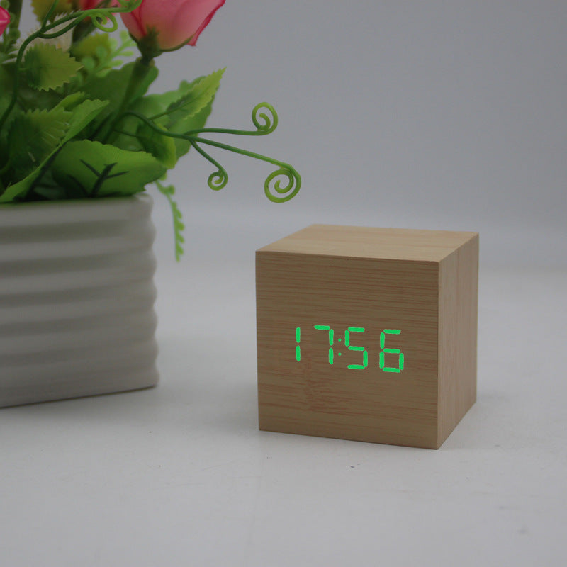 Minimalist Cube shaped sound-sensitive wooden digital clock with temperature display